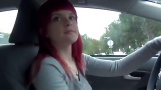 Look at on sexually wild and sexy red haired tramp is posing in the car